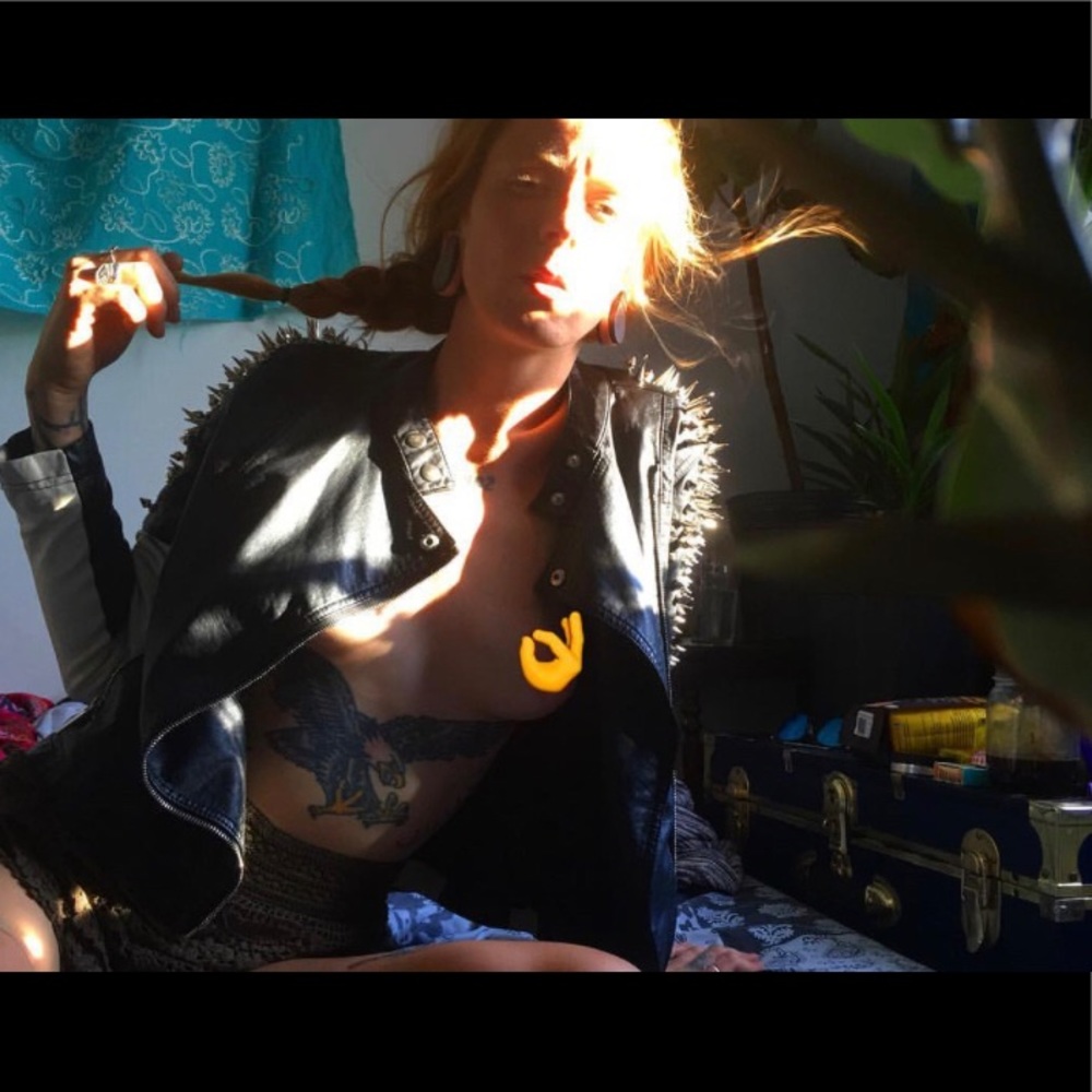 Hand studded black and white moto jacket